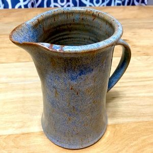Stoneware pitcher.